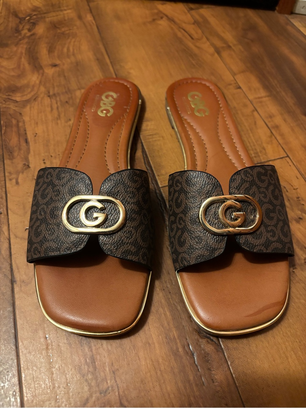G by Guess Women’s Brown Monogram Slide Sandals with Gold Accent — Size 9